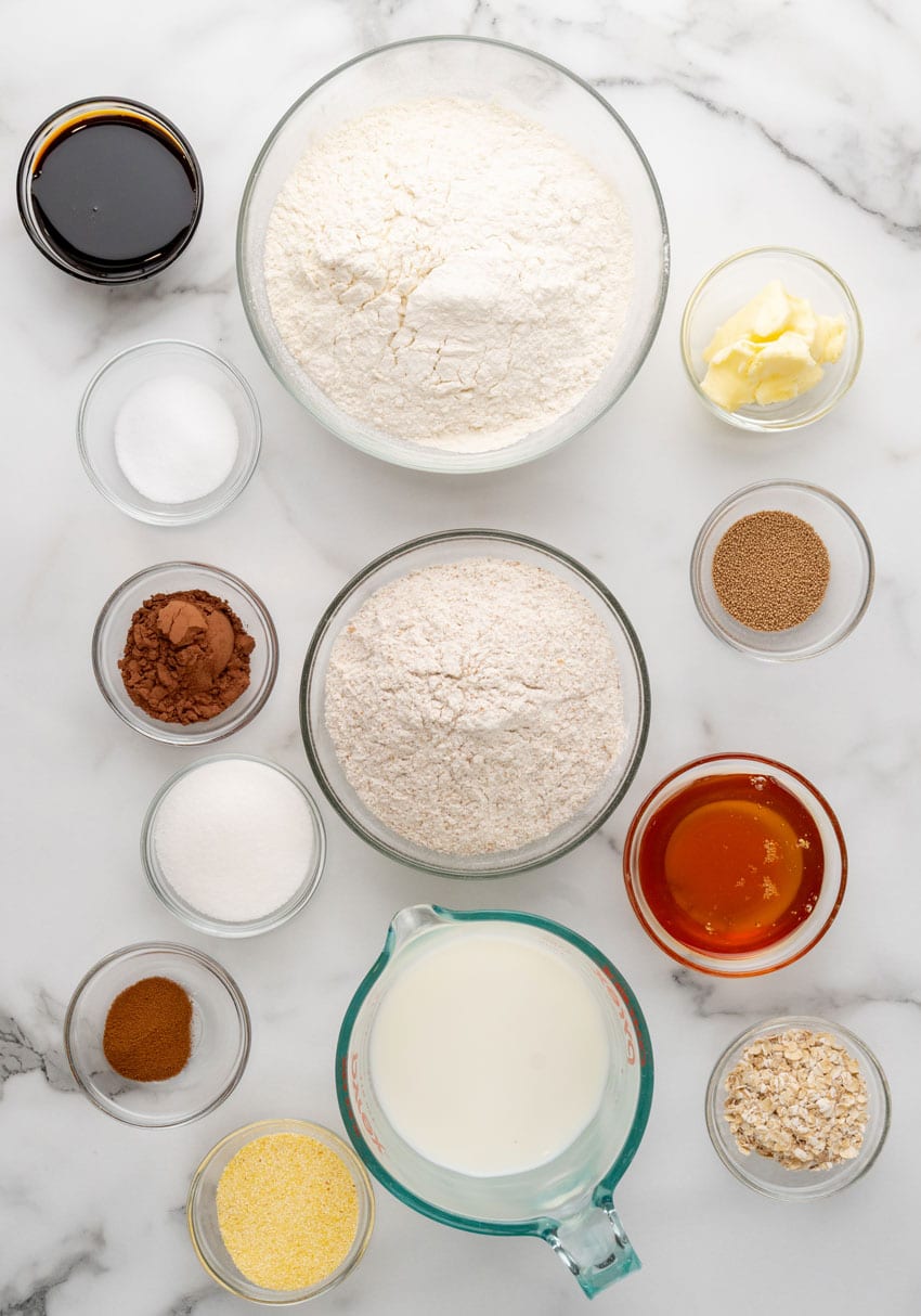 an overhead image showing the measured ingredients needed to make a batch of copycat cheesecake factory brown bread