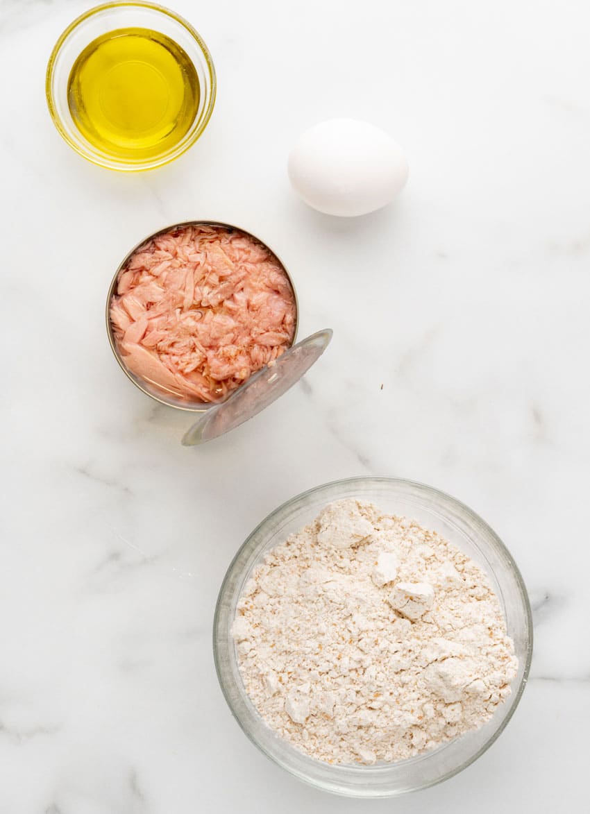 an overhead image showing the measured ingredients needed to make a batch of homemade cat treats