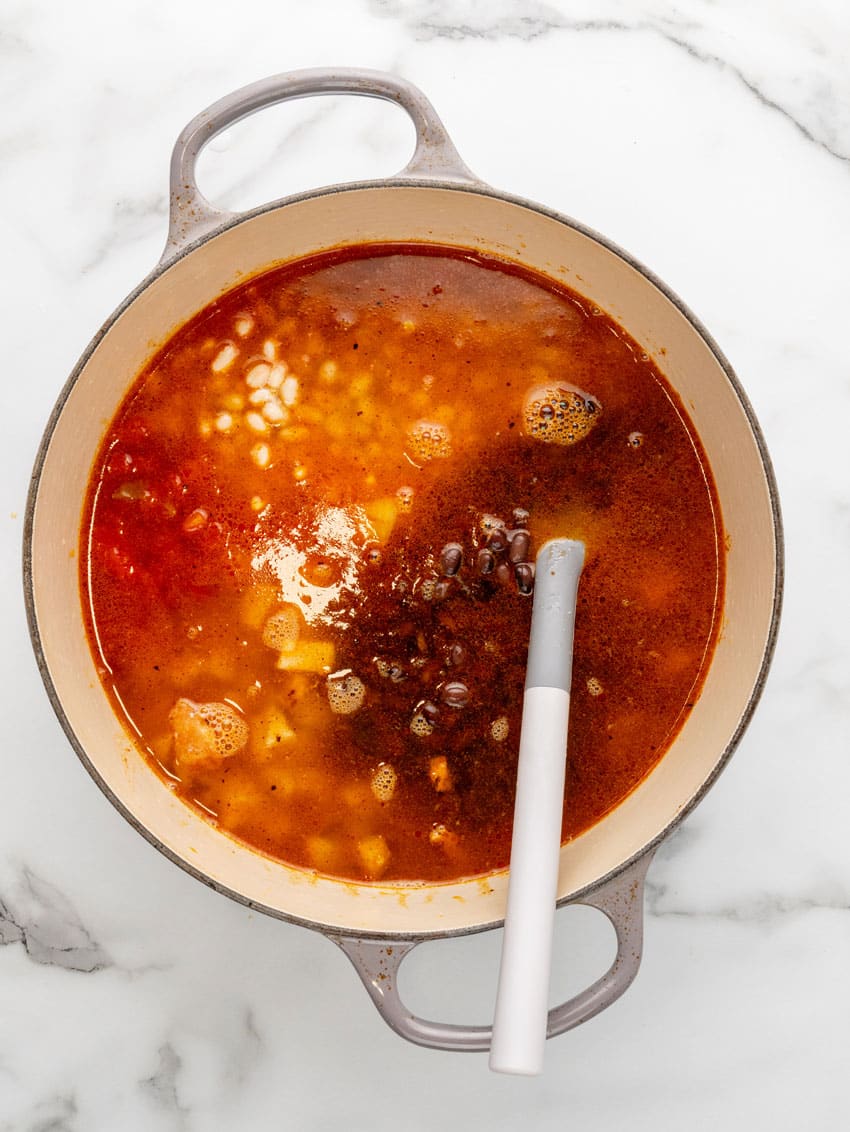 homemade copycat chick fil a chicken tortilla soup ingredients in a large dutch oven