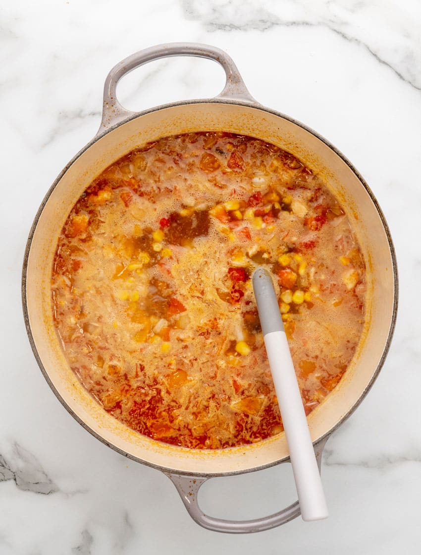 homemade copycat chick fil a chicken tortilla soup ingredients in a large dutch oven