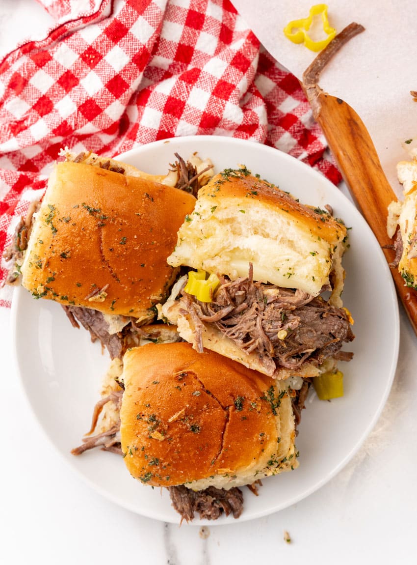 three mississippi pot roast sliders on a small white plate