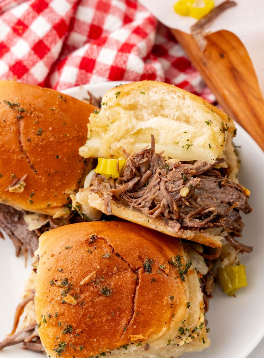 three mississippi pot roast sliders on a small white plate